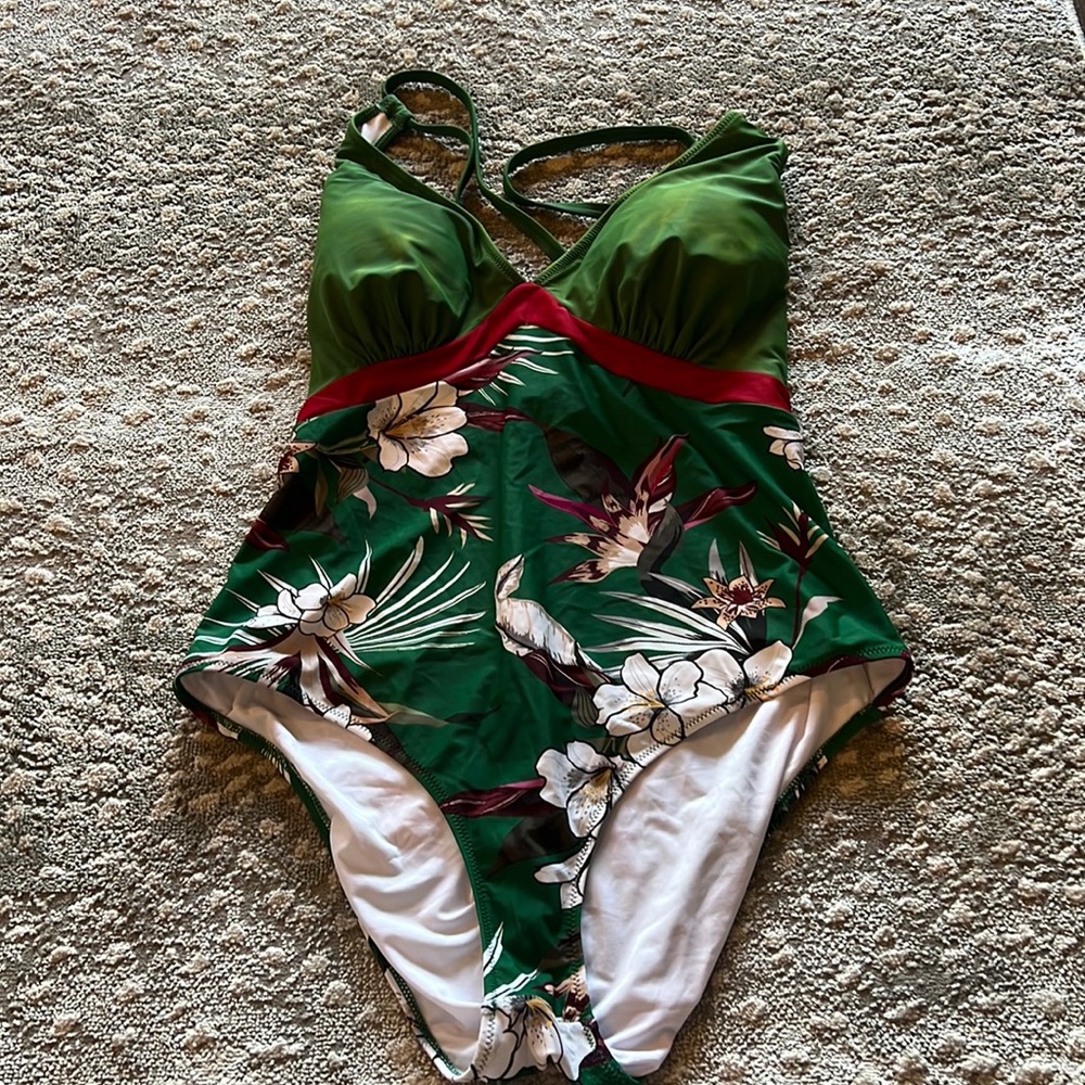 Green one piece swim suit